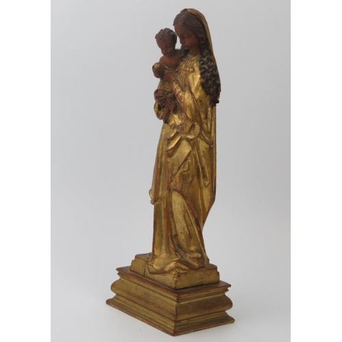 58 - An Italian Florentine gilt carved statue of Madonna and Child, circa 1900. ‘Cornici Moscardi of Via ... 