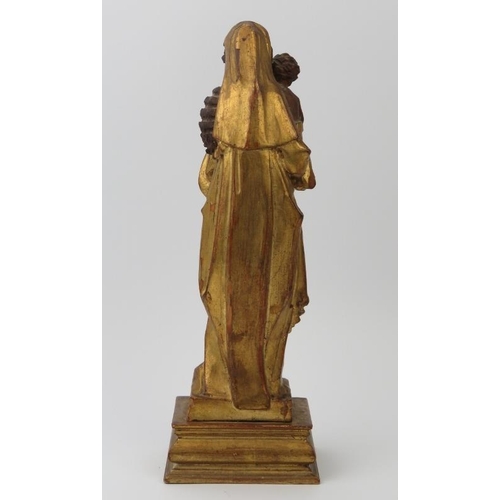 58 - An Italian Florentine gilt carved statue of Madonna and Child, circa 1900. ‘Cornici Moscardi of Via ... 