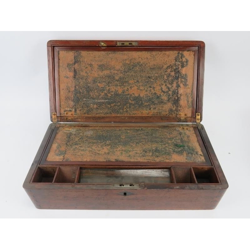 79 - A mahogany writing slope with brass fittings and a rosewood sewing box, 19th century. Both boxes wit... 