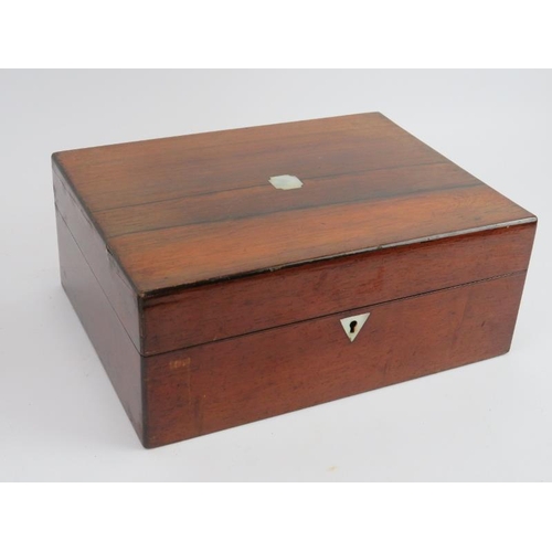 79 - A mahogany writing slope with brass fittings and a rosewood sewing box, 19th century. Both boxes wit... 