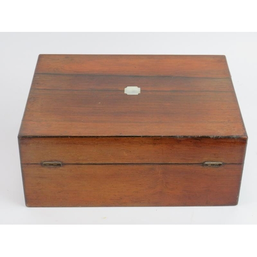 79 - A mahogany writing slope with brass fittings and a rosewood sewing box, 19th century. Both boxes wit... 