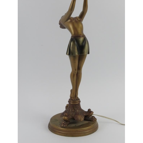 81 - An Art Deco semi nude dancing female table lamp, early 20th century. cm height.
Condition report: So... 