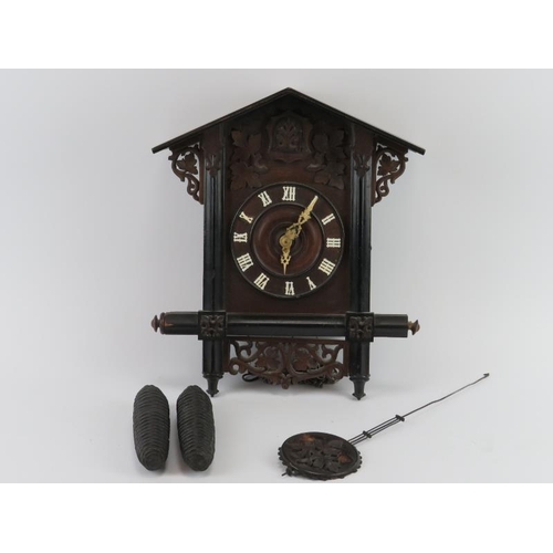 92 - A Swiss Black Forest style cuckoo wall clock, early 20th century. 35.5 cm height. 
Condition report:... 