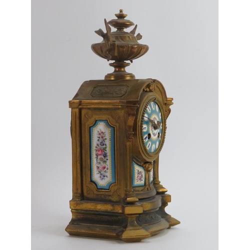 93 - A French ormolu and Sevres style enamelled porcelain mounted mantle clock, 19th century. With a Japy... 