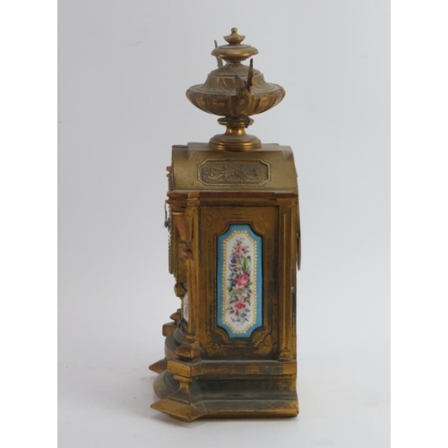 93 - A French ormolu and Sevres style enamelled porcelain mounted mantle clock, 19th century. With a Japy... 