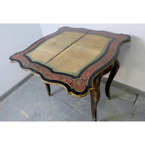 707 - A 19th century Napoleon III boulle work and ebonised serpentine fronted turnover card table, having ... 