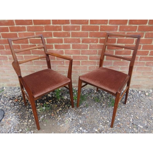 711 - A mid-century Afromosia teak draw-leaf extending dining table by Richard Hornby for Heal’s, with add... 