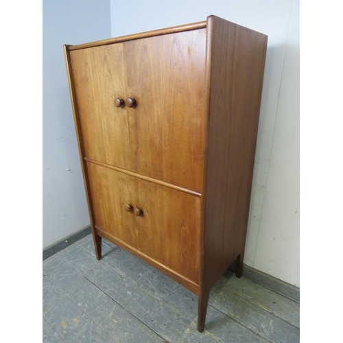 714 - A mid-century teak drinks cabinet by Younger, the double doors opening to reveal a fitted interior w... 