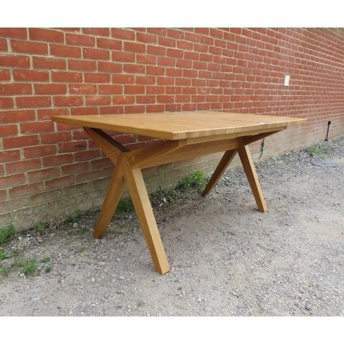 715 - A contemporary light oak draw-leaf extending dining table, with additional leaf, by Bethan Gray, on ... 