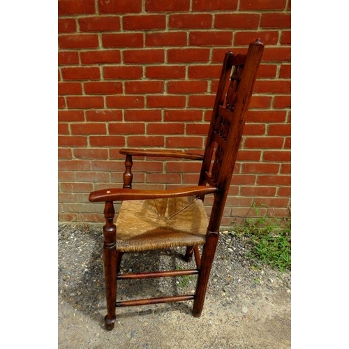 716 - A matched set of 10 (8+2) 19th century elm Lancashire spindle-back dining chairs, with rush seats, o... 