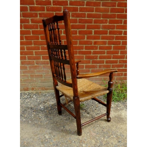 716 - A matched set of 10 (8+2) 19th century elm Lancashire spindle-back dining chairs, with rush seats, o... 