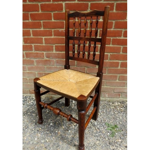 716 - A matched set of 10 (8+2) 19th century elm Lancashire spindle-back dining chairs, with rush seats, o... 