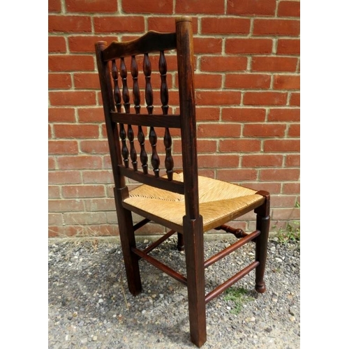 716 - A matched set of 10 (8+2) 19th century elm Lancashire spindle-back dining chairs, with rush seats, o... 