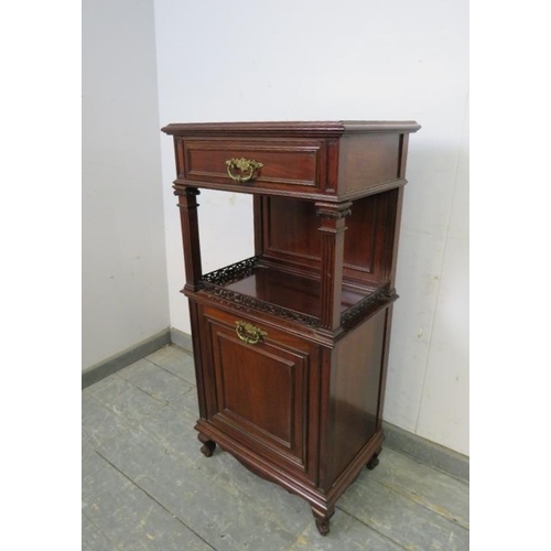 721 - An Edwardian mahogany side cabinet, having one long drawer above an open shelf with reeded Ionic col... 