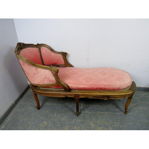 734 - An antique French walnut daybed, the carved frame with acanthus leaf and foliate detail, upholstered... 