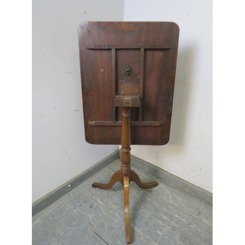 744 - A 19th century pale mahogany tilt-top wine table, on a baluster turned pedestal with splayed tripod ... 