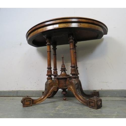 755 - A Victorian burr walnut demi-lune turnover card table, the top with marquetry inlay, on a cluster co... 