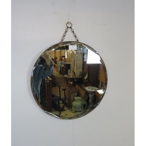 759 - An Art Deco Period circular wall mirror, with bevelled edge. 
Diameter 40cm (approx).
Condition repo... 