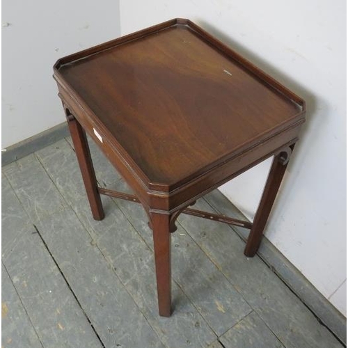 795 - A mahogany occasional table in the Chippendale taste, the galleried top on inner chamfered square su... 