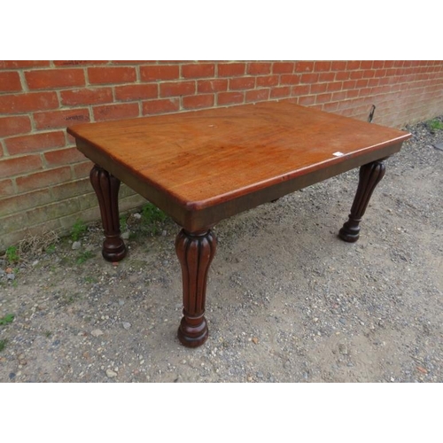 805 - A 19th century mahogany coffee table, on baluster turned fluted supports. 
H56cm W121cm D72cm (appro... 