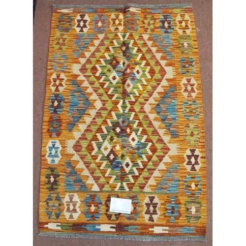 855 - A fine Chobi Kilim rug, central interlocking diamond pattern with strong colours and good condition.... 