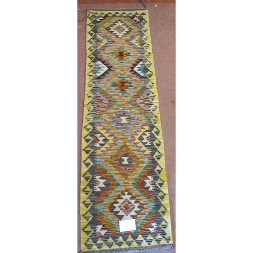 855 - A fine Chobi Kilim rug, central interlocking diamond pattern with strong colours and good condition.... 