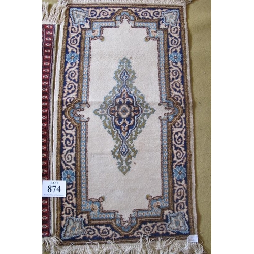 874 - Three rugs, to include a Persian and wool rugs. Largest rug 130cm x 80cm (approx).
Condition report:... 