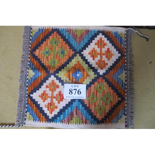 876 - A small Chobi Kilim mat, repeat diamond motif. Good colours and condition. 50cm x 50cm.
A tapestry s... 