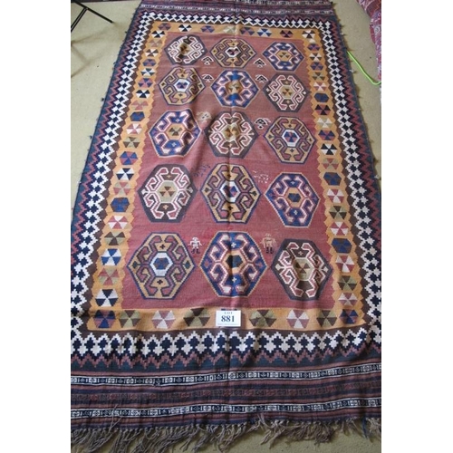 881 - A large Qashqai Kilim rug with fifteen central motifs & stylised figures. 270cm x 150cm (approx).
Co... 