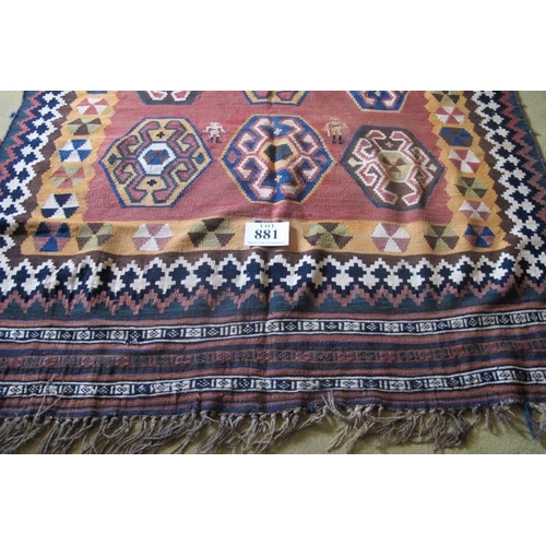 881 - A large Qashqai Kilim rug with fifteen central motifs & stylised figures. 270cm x 150cm (approx).
Co... 