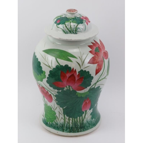 1 - A Chinese famille rose lotus decorated vase and cover, early 20th century. Of baluster form, the ext... 