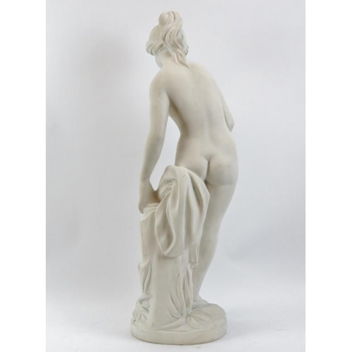 104 - A composite stone statue of Venus bathing, 20th century. 69 cm height. 
Condition report: Light age ... 