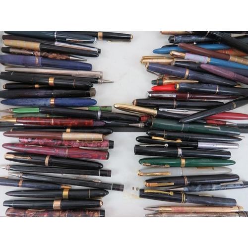 107 - A large collection of vintage fountain pens. Notable makers include Waterman’s, Parker, Unique and E... 