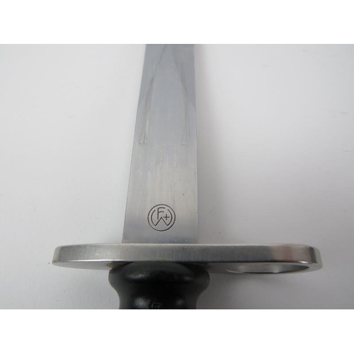 108 - A Swiss knife bayonet and scabbard, circa 1981. Makers mark of Waffenfabrik Bern (W&F) and Wenger (W... 