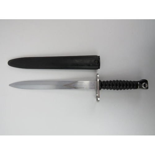 108 - A Swiss knife bayonet and scabbard, circa 1981. Makers mark of Waffenfabrik Bern (W&F) and Wenger (W... 