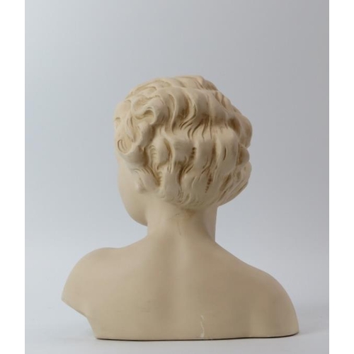 116 - An Art Deco style plaster bust of a young woman, mid 20th century. 25 cm height. 
Condition report: ... 