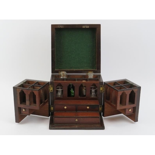 12 - An antique mahogany travellers apothecary medicine box, 19th century. With compartmented interior an... 