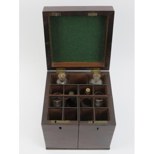 12 - An antique mahogany travellers apothecary medicine box, 19th century. With compartmented interior an... 