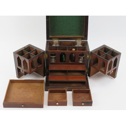 12 - An antique mahogany travellers apothecary medicine box, 19th century. With compartmented interior an... 