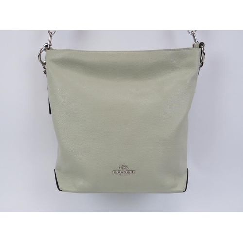 125 - A Coach ‘Abby’ leather duffle bag. Mint green leather with silver hardware, adjustable / removable c... 