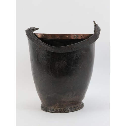 133 - A Georgian copper banded and studded leather fire bucket with strap handle, 18th century.
Condition ... 