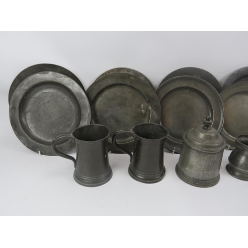 145 - A quantity of antique pewter including 10 plates, four measures and an engraved tobacco jar.  Plates... 