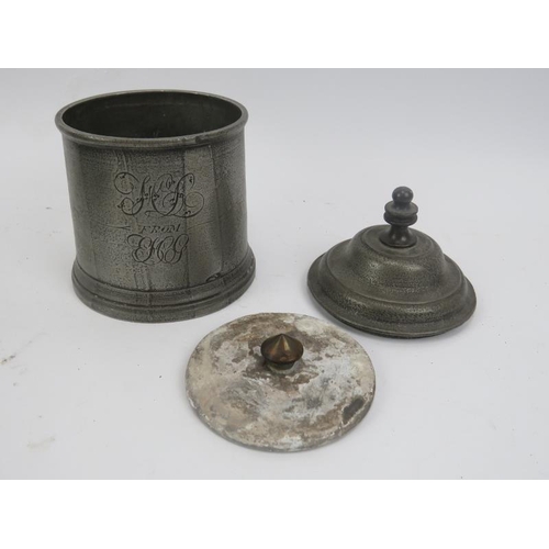 145 - A quantity of antique pewter including 10 plates, four measures and an engraved tobacco jar.  Plates... 