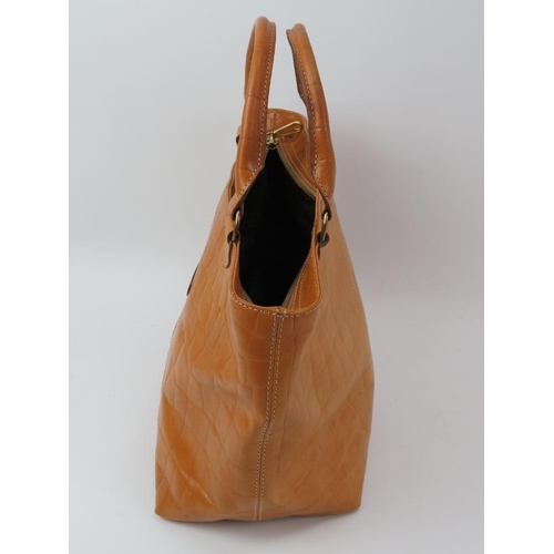 149 - A Mulberry top handled light tan Congo leather handbag. Zip closure and Mulberry dustbag included. M... 