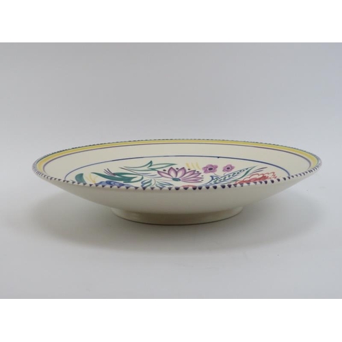 156 - A Poole Pottery ‘Traditional Ware’ charger, mid 20th century. 33 cm diameter.
Condition report: Good... 