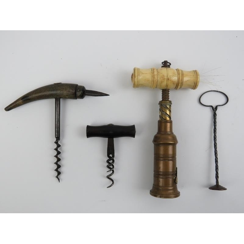 163 - Three antique corkscrews and a cocktail stirrer. Corkscrews include a Dowler type corkscrew with tur... 