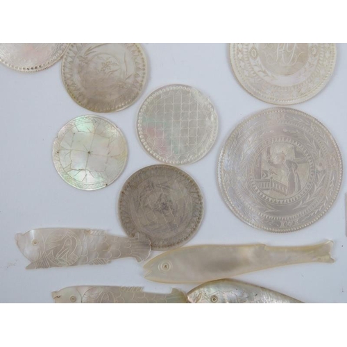 164 - A collection of Chinese mother of pearl finely engraved gaming tokens. (Quantity) 4.3 cm diameter of... 