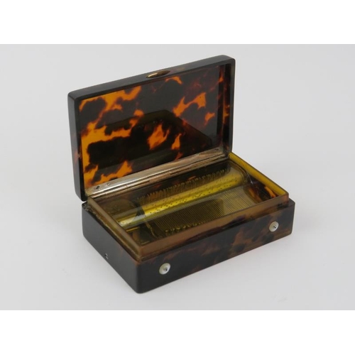 166 - A rare Swiss miniature tortoiseshell musical snuff box, 19th century. With a horn dust cover display... 