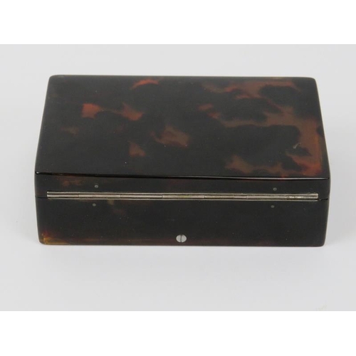 166 - A rare Swiss miniature tortoiseshell musical snuff box, 19th century. With a horn dust cover display... 