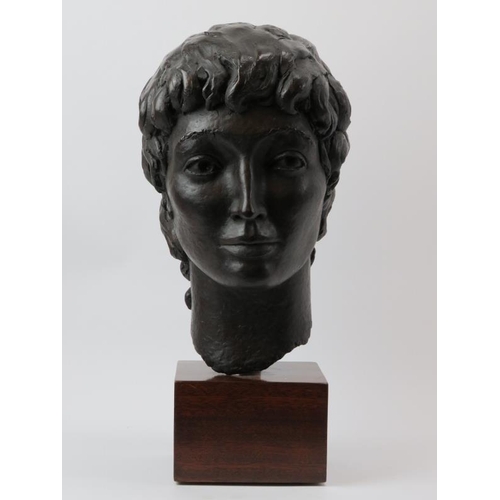 167 - A large bronzed study of a female head, late 20th century. ‘PJW’ monogram to the reverse. Displayed ... 